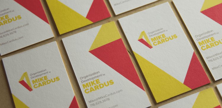 Mike Cardus business cards close-up